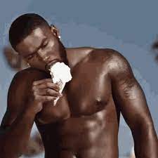 ripped guy eating ice cream
